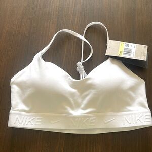 Brand New with tags, white NIKE Indy Bra Size Small.